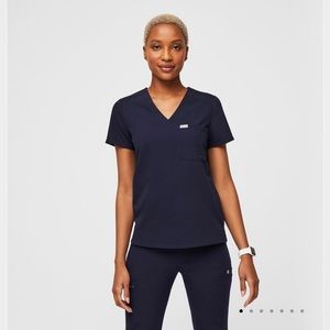 FIGS: Navy, one pocket scrub top. Size XS